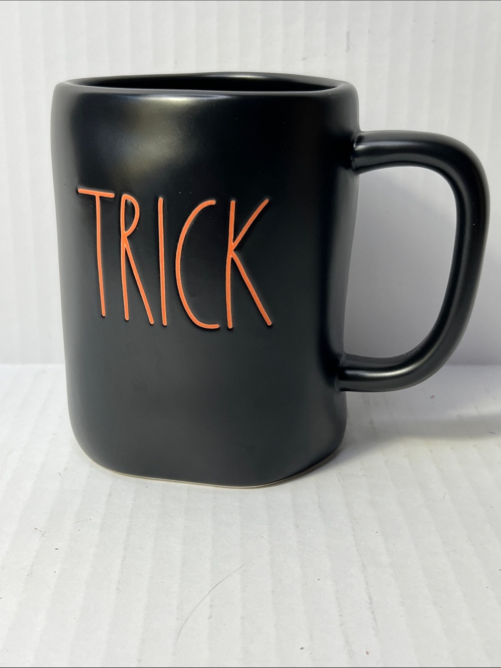 Rae Dunn Black Mug with Orange 'TRICK’ ‘TREAT’ Lettering